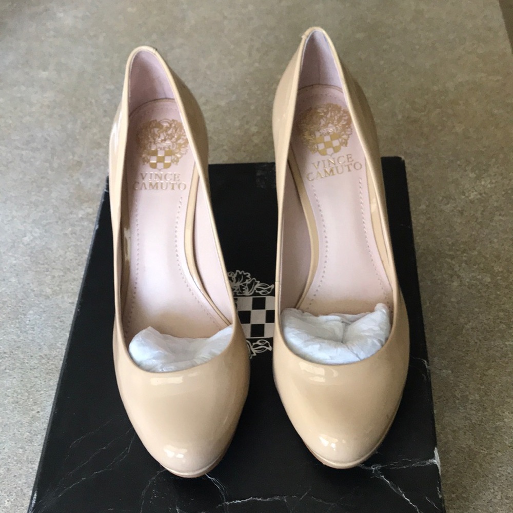 Nude patent pumps